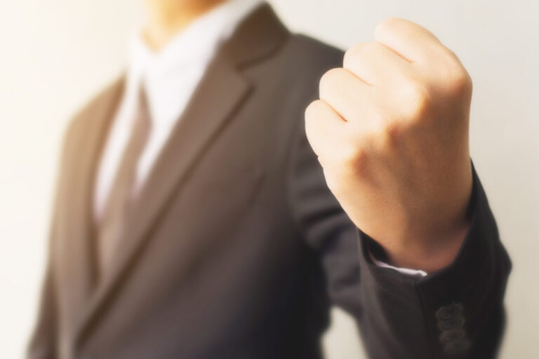 Businessman hand showing fist sign gesture